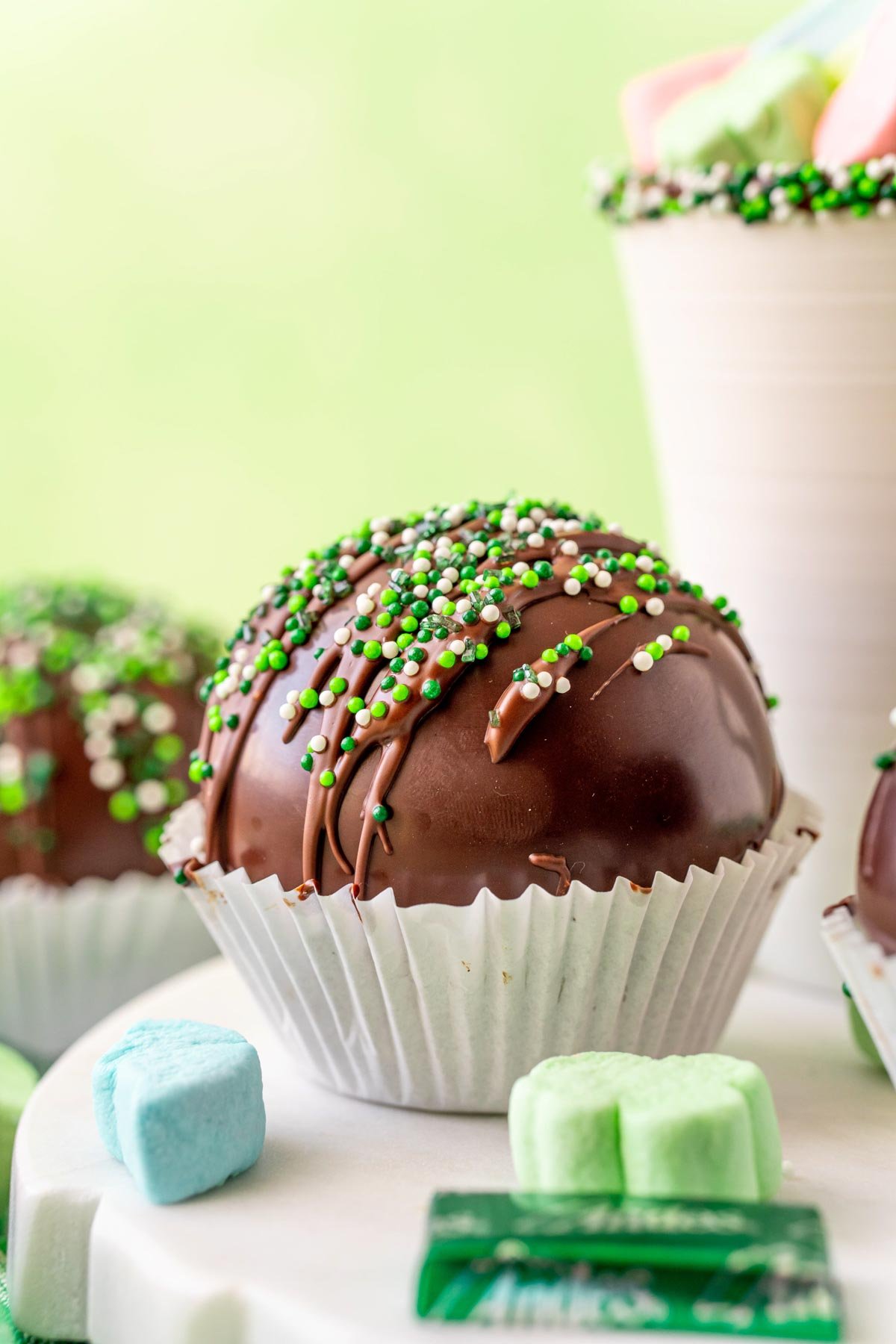 Mint hot chocolate bombs with Andes mints around