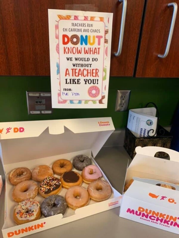 Donuts with a sign hanging above them