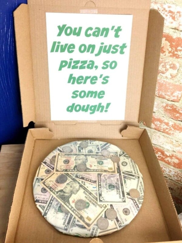 pizza box filled with cash