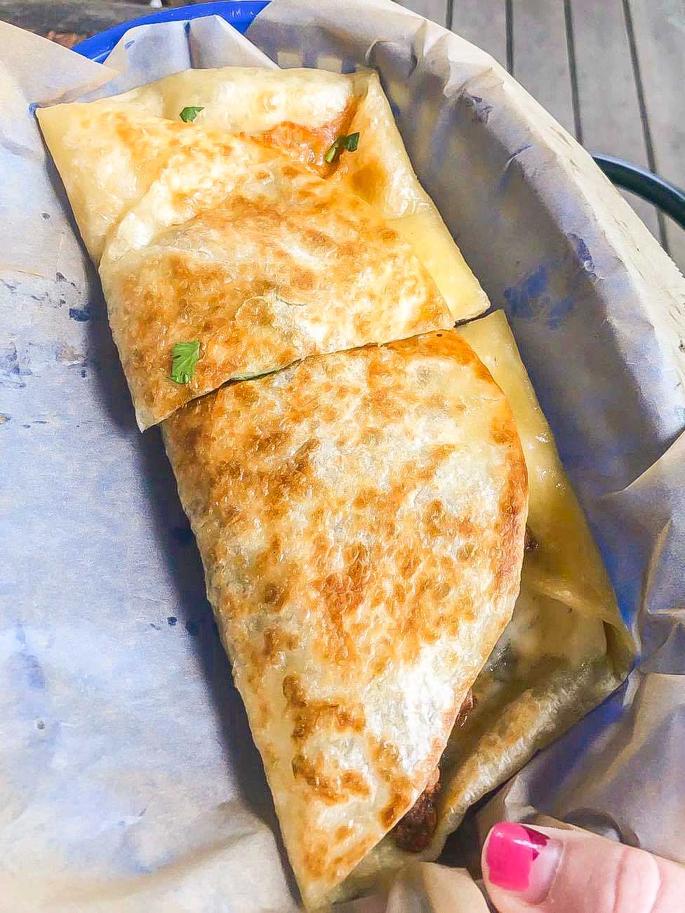 Chicken quesadilla cut in half