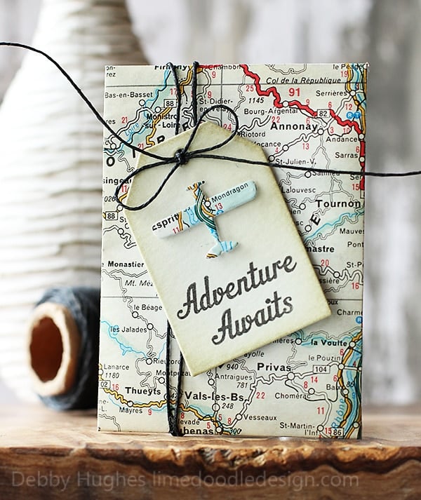 Adventure awaits tag on a journal