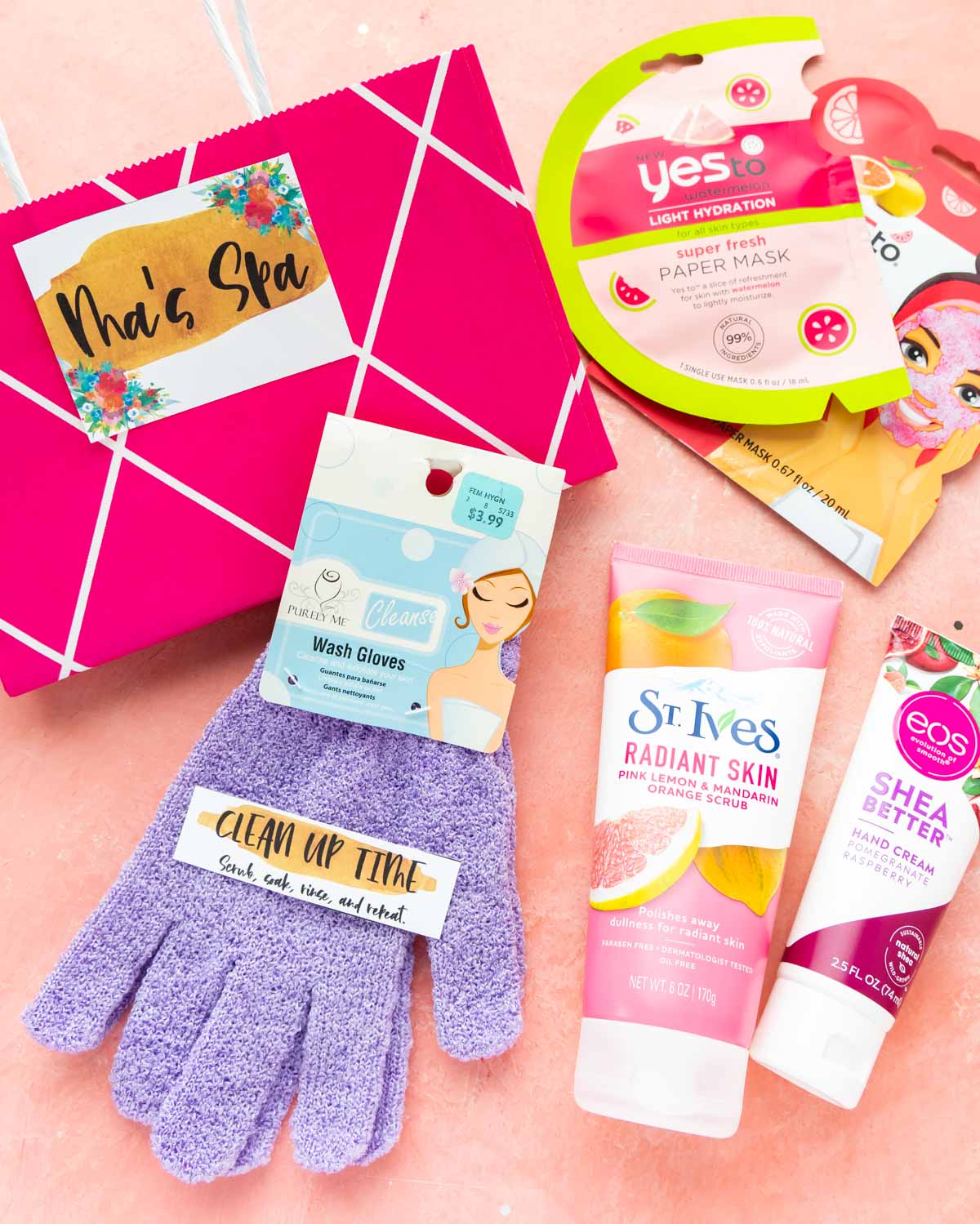 Pink gift bag with spa items all around