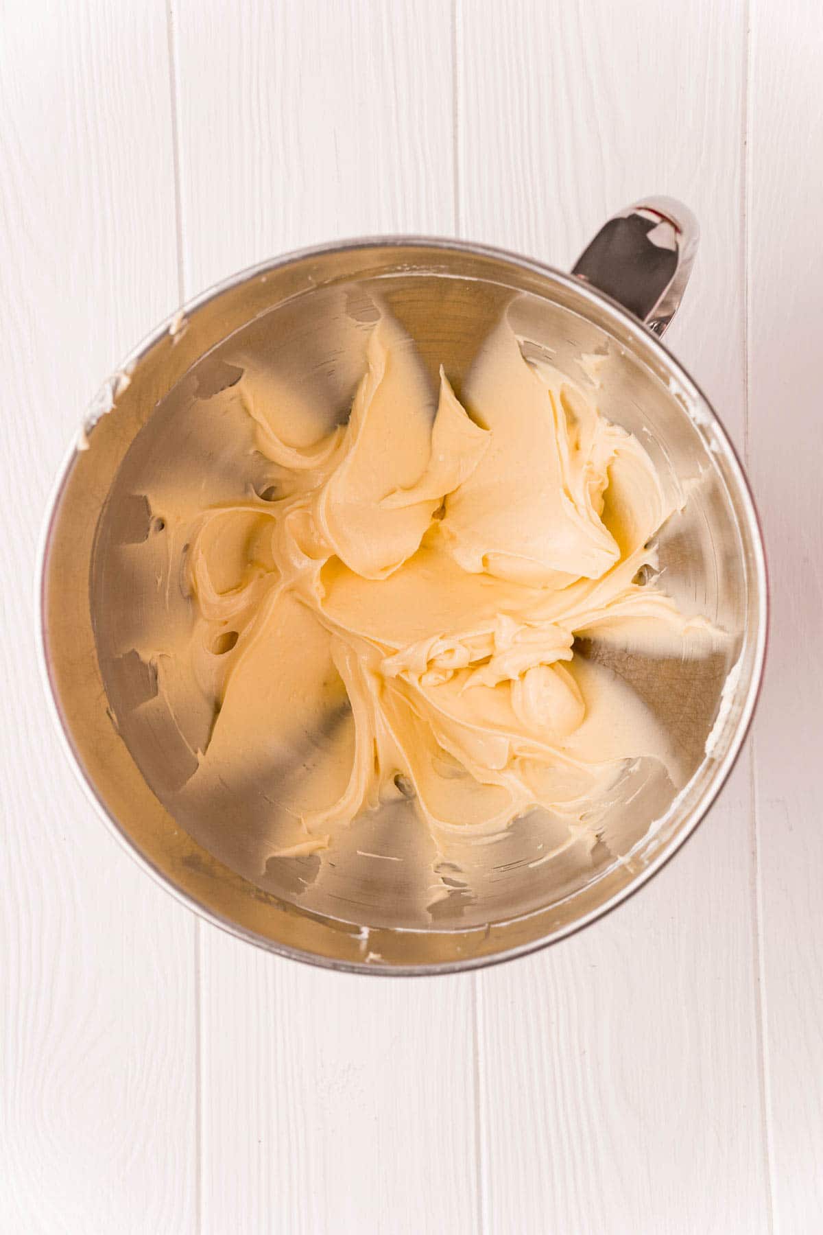 cream cheese filling in a metal bowl