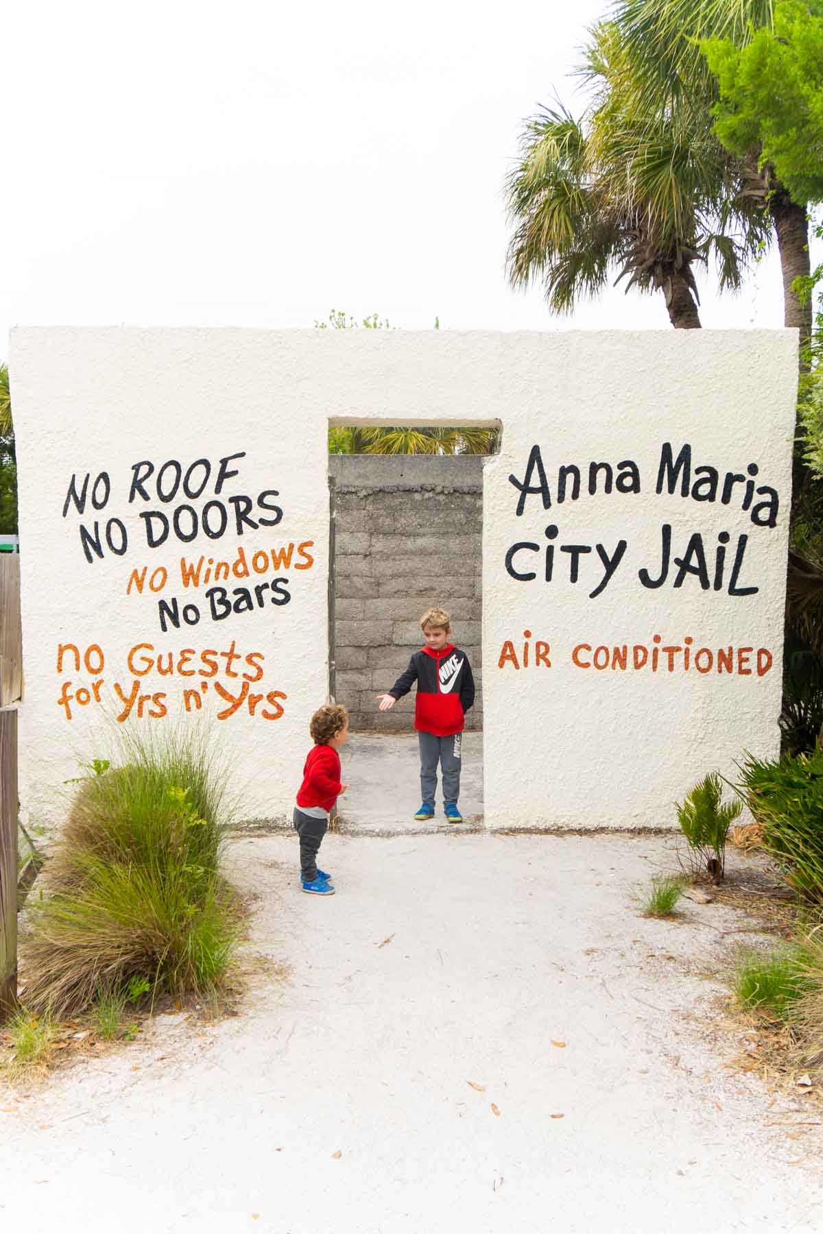 Two boys by Anna Maria city jail