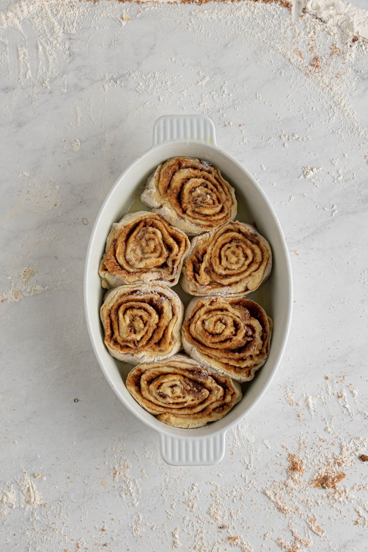 bacon cinnamon rolls in a baking wish