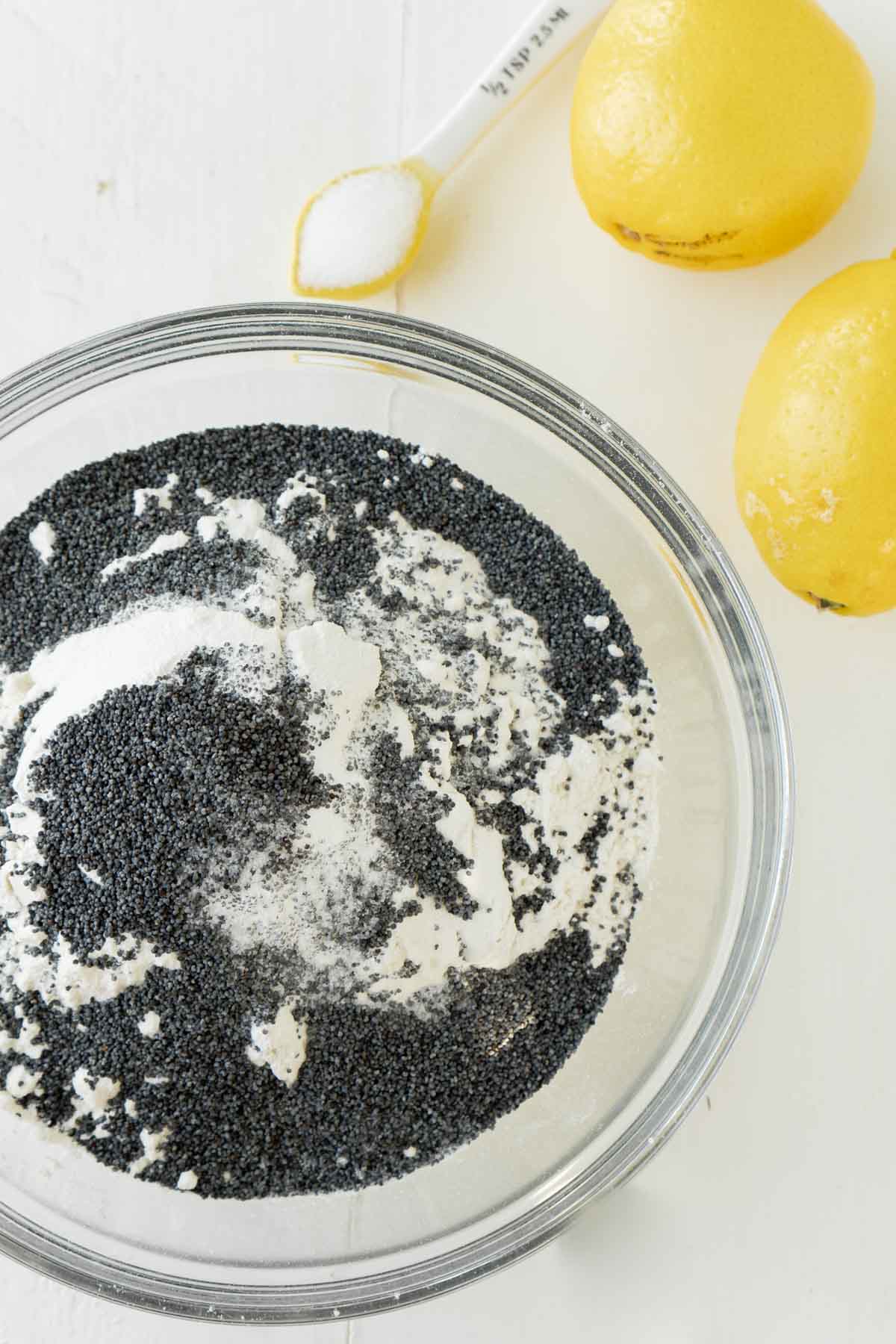 glass bowl with flour and poppy seeds