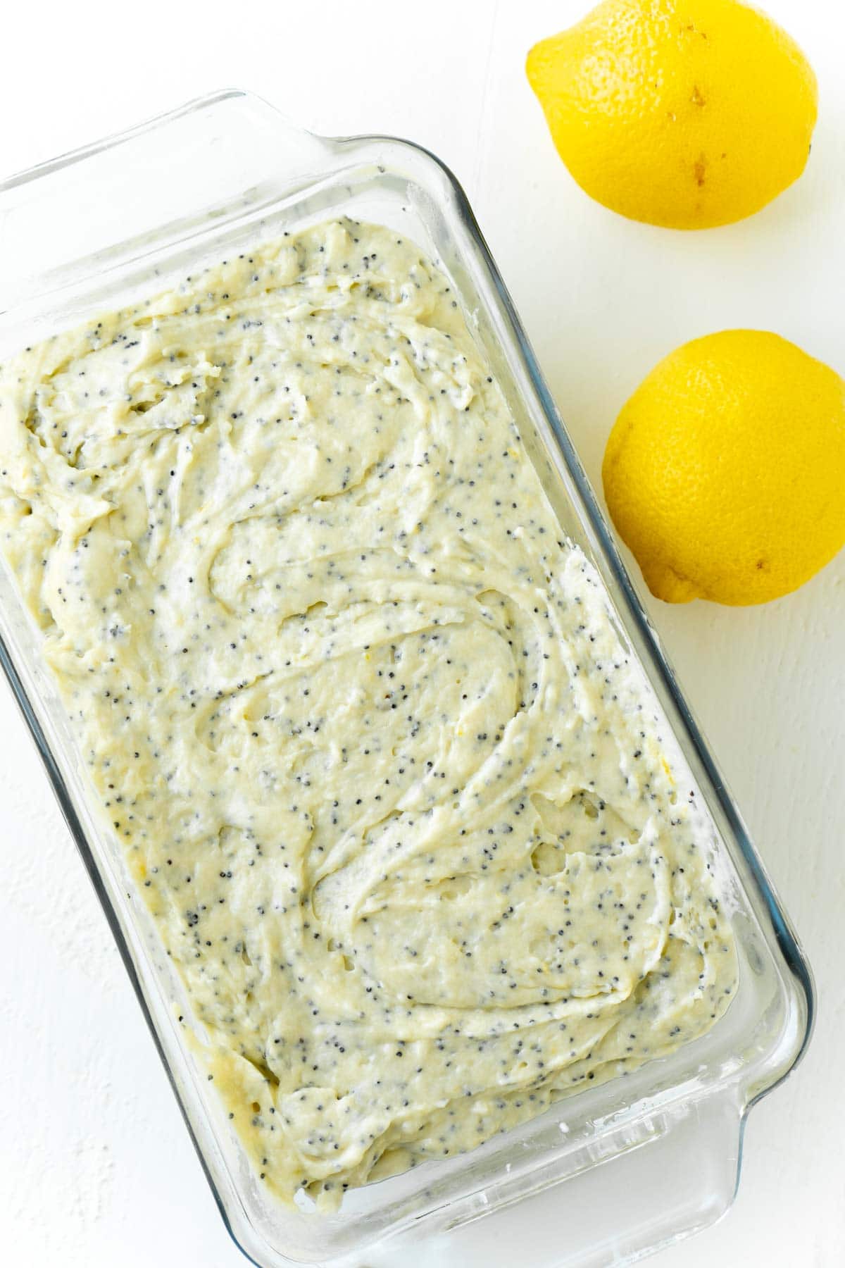 lemon poppy seed bread batter in a loaf pan