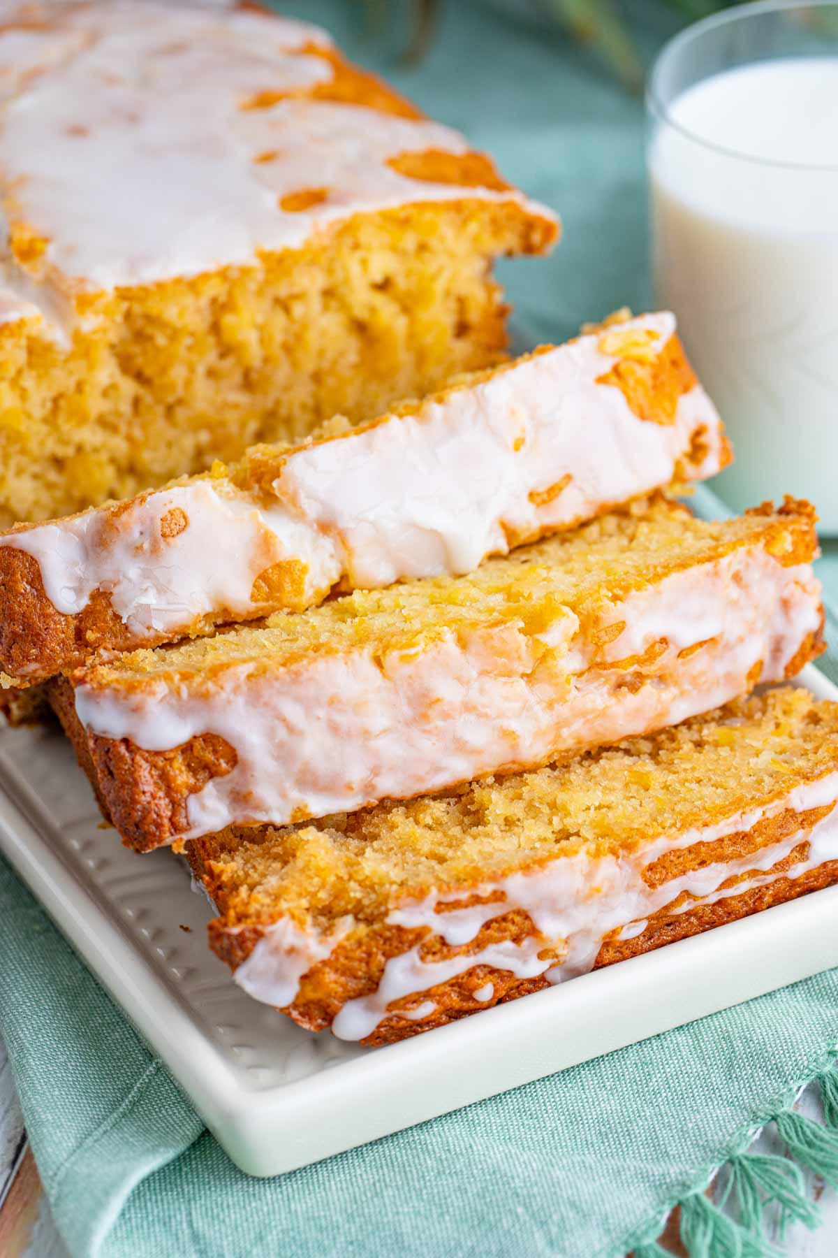 Sliced pineapple bread on a white plate