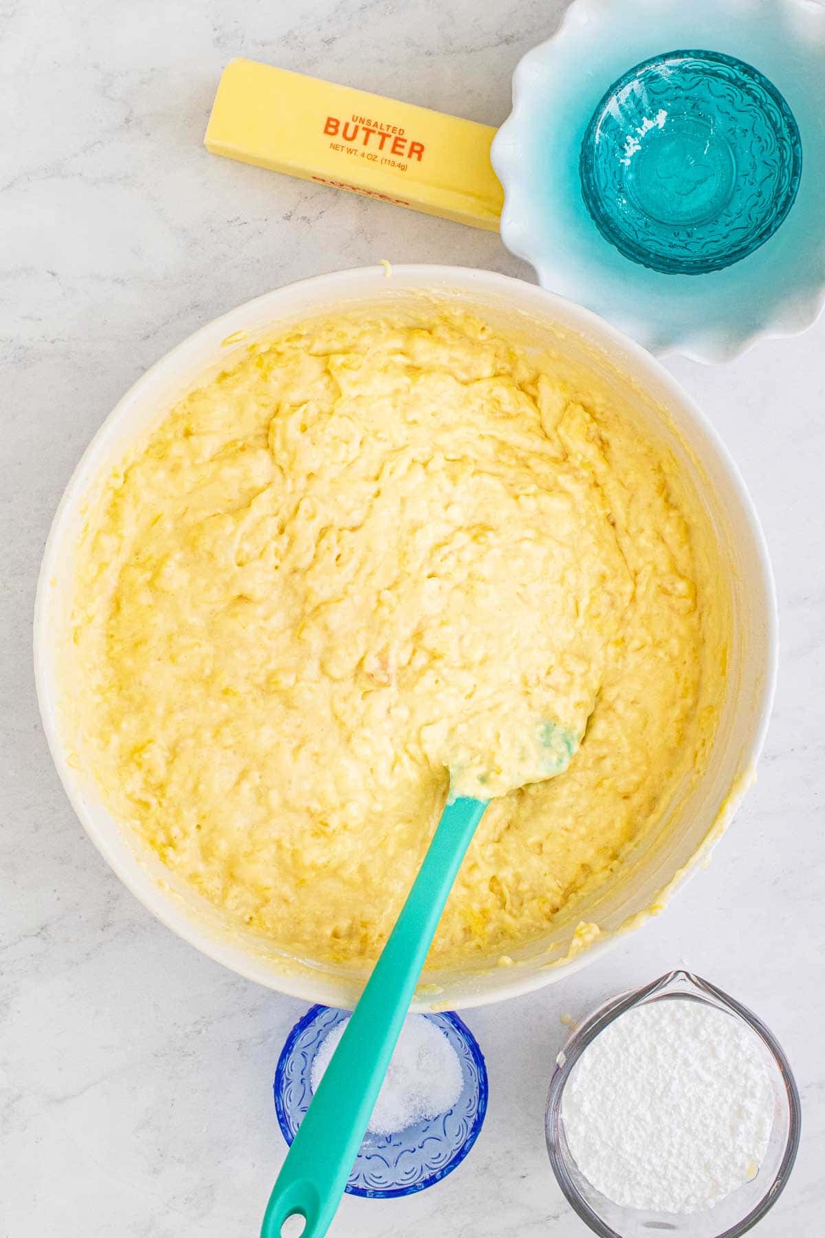 white bowl with pineapple bread batter