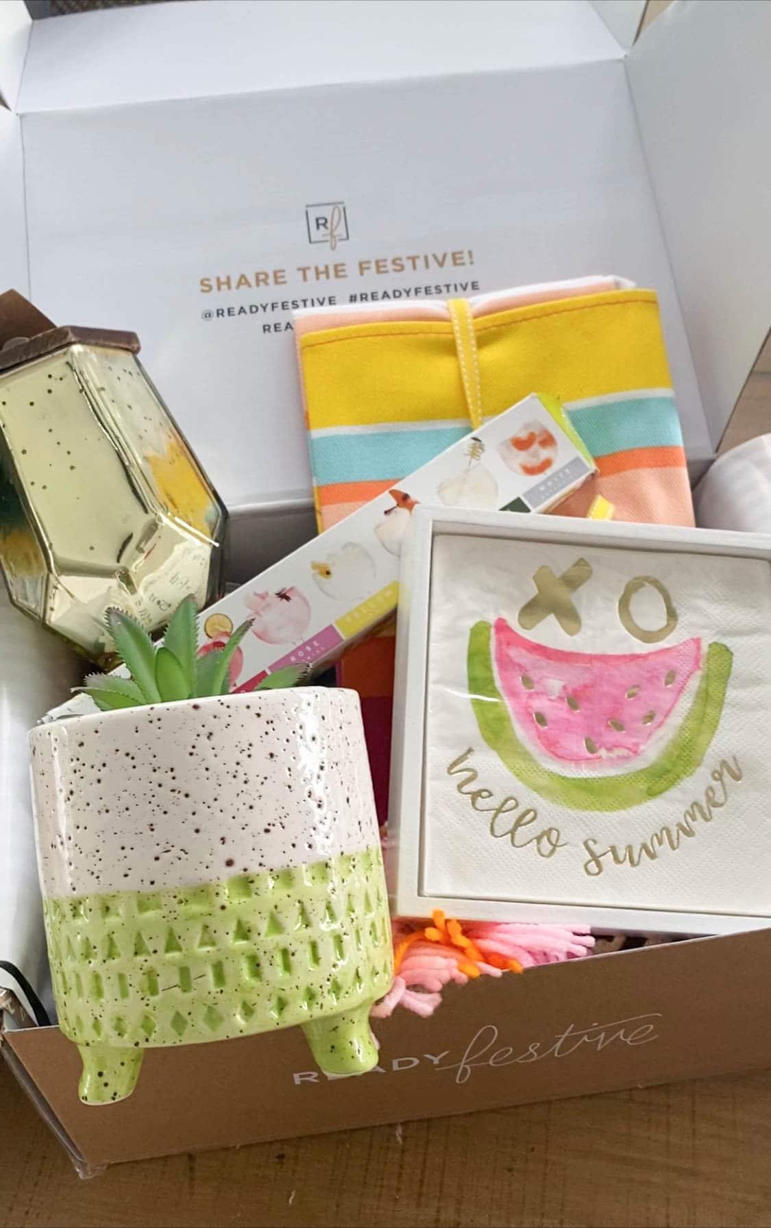 box filled with summer decorating items