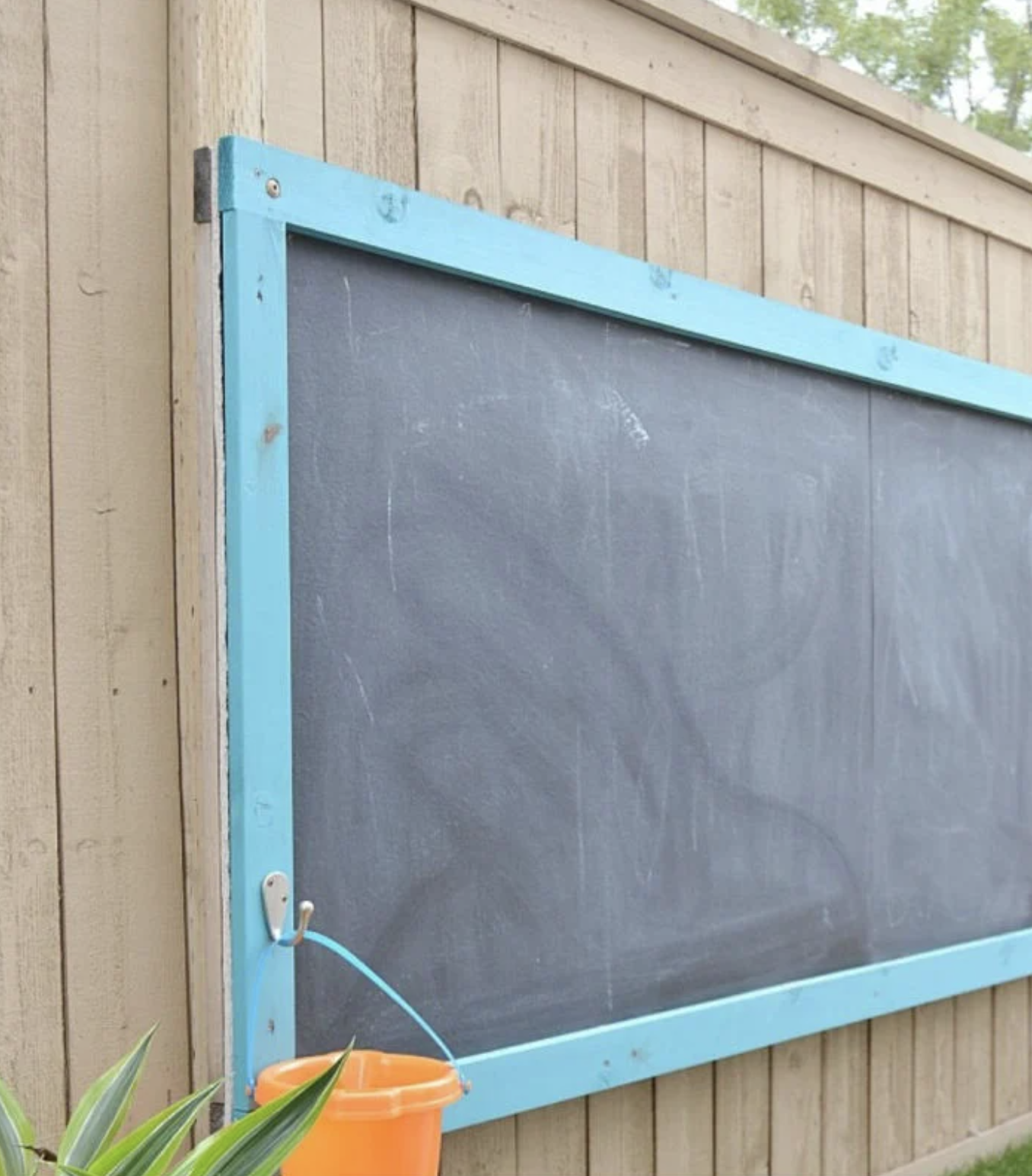 giant chalkboard on a fence