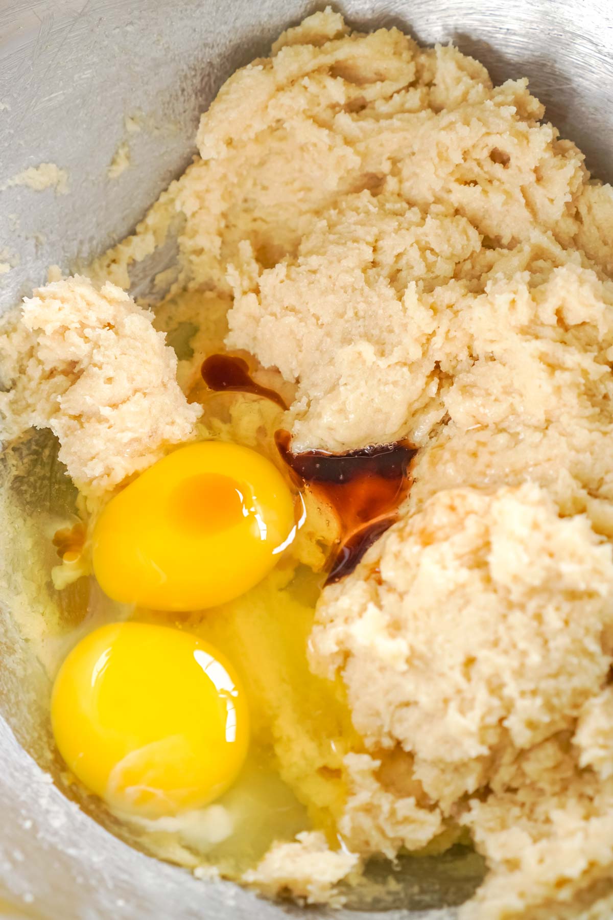 Bowl with creamed sugars and eggs