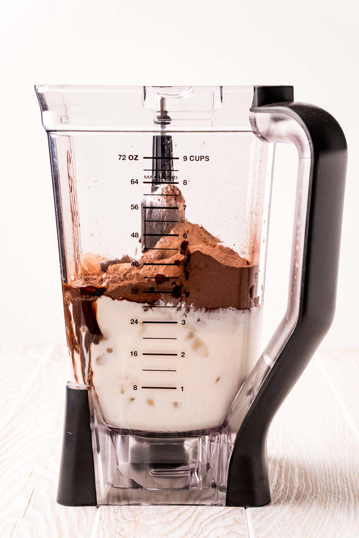 blender with ingredients for frozen hot chocolate
