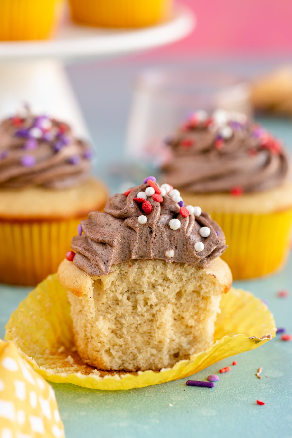 grey stuff on top of yellow cupcakes