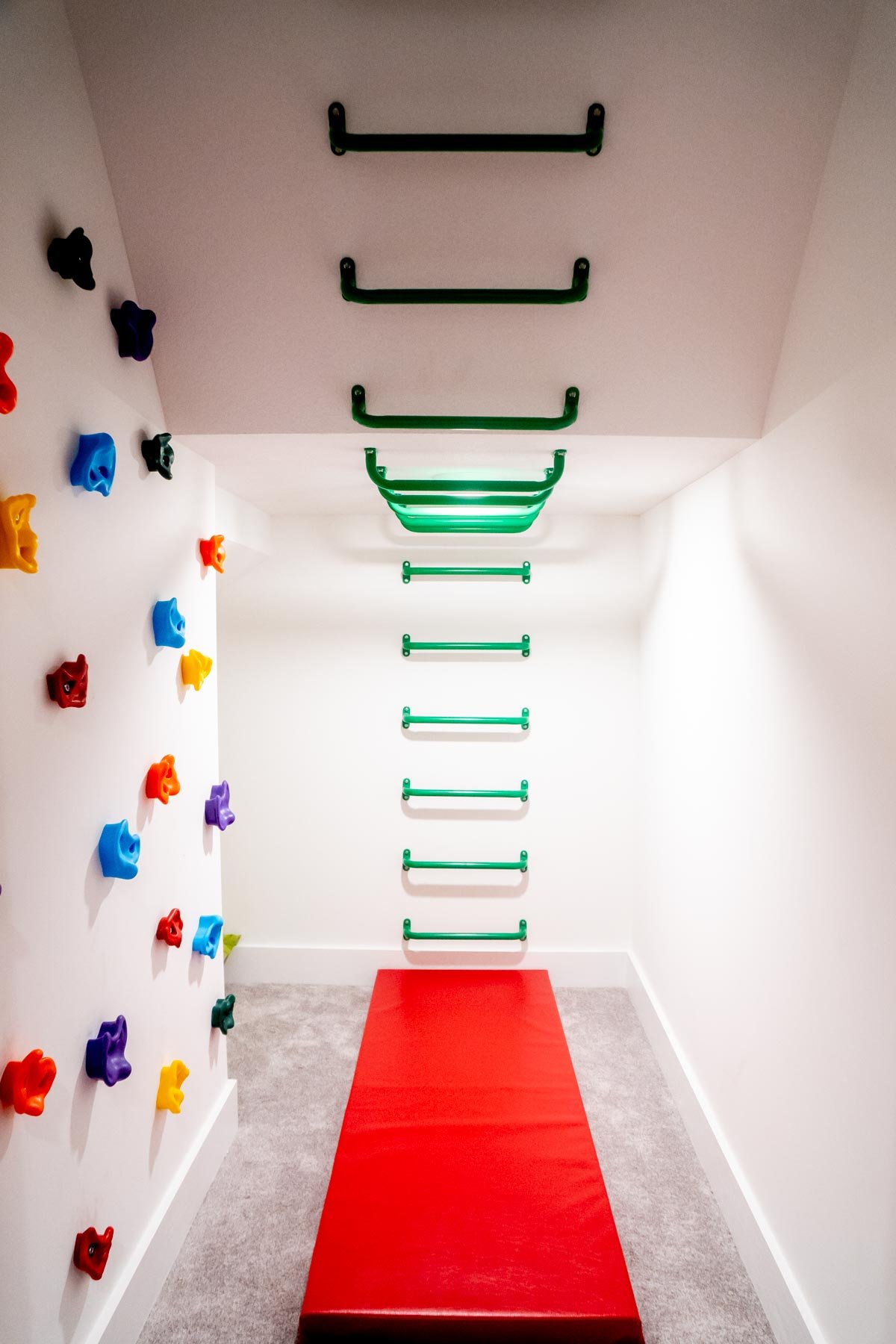 modern playroom for kids with monkey bars