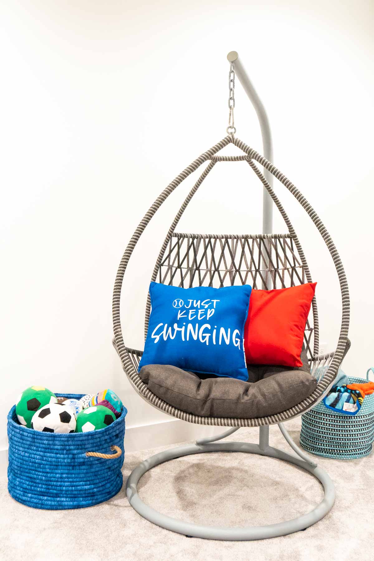 chair swing with pillows on it