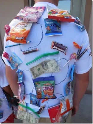 man in a shirt with candy taped to it