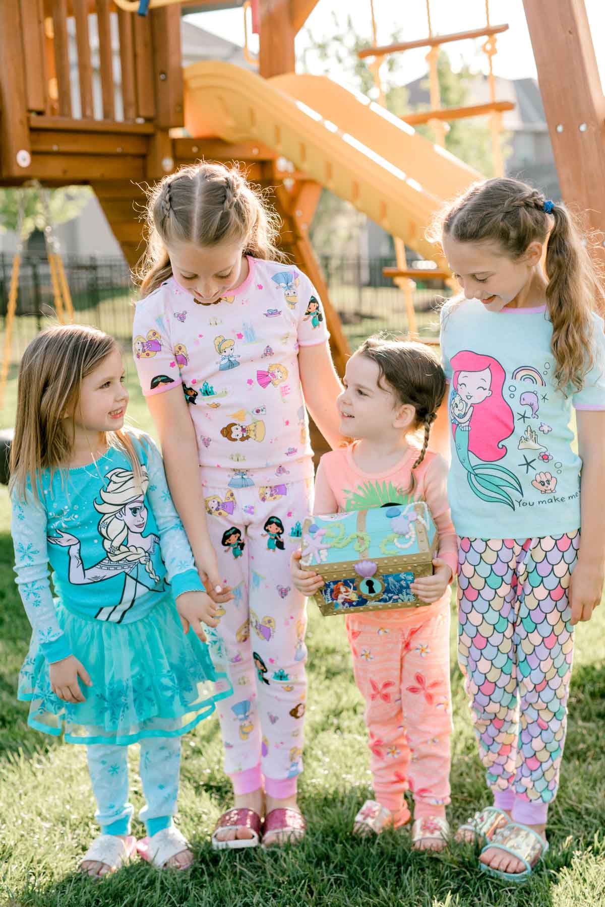 Four girls in princess pajamas together