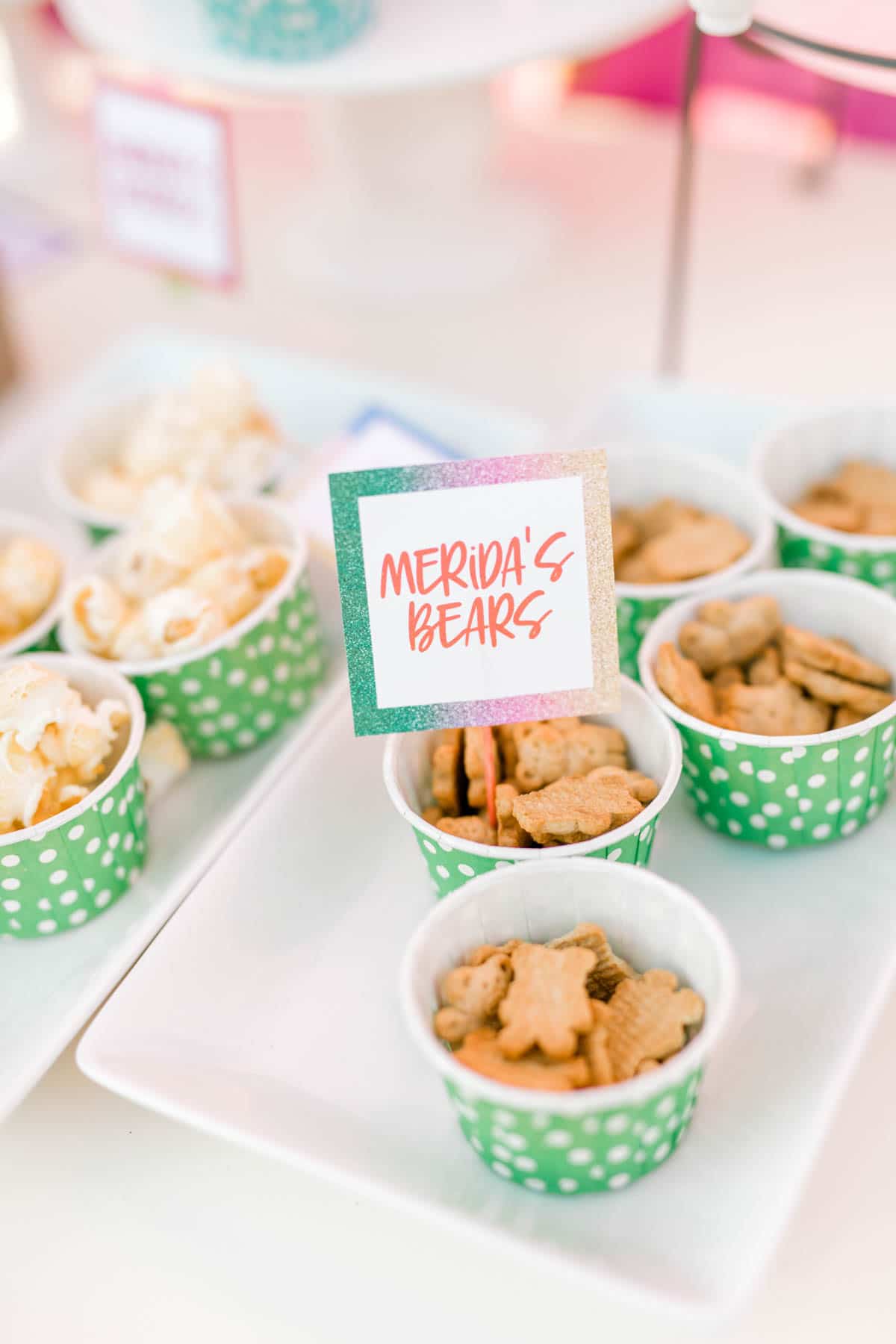 green cups full of Teddy Grahams