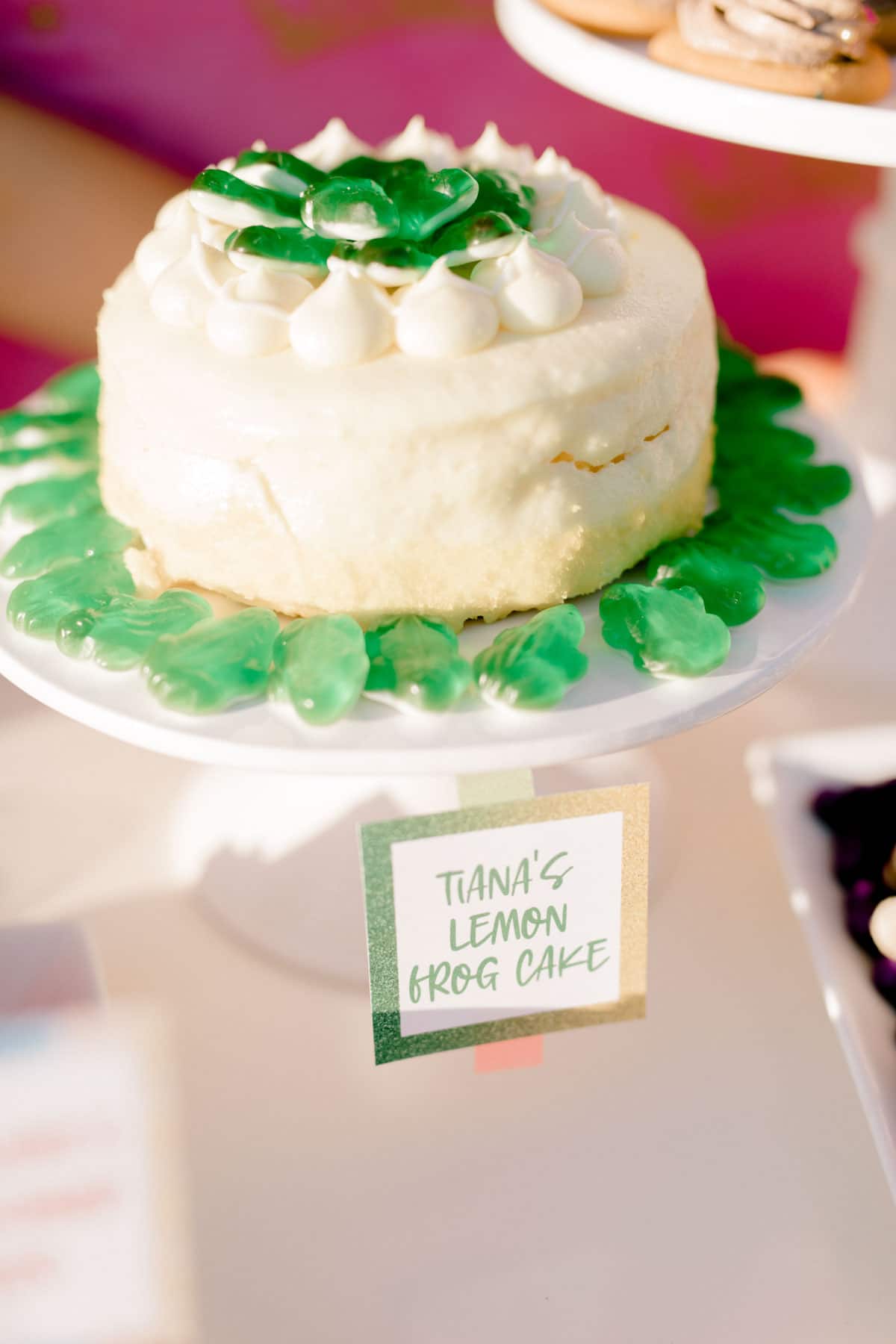 yellow lemon cake with green frogs on top