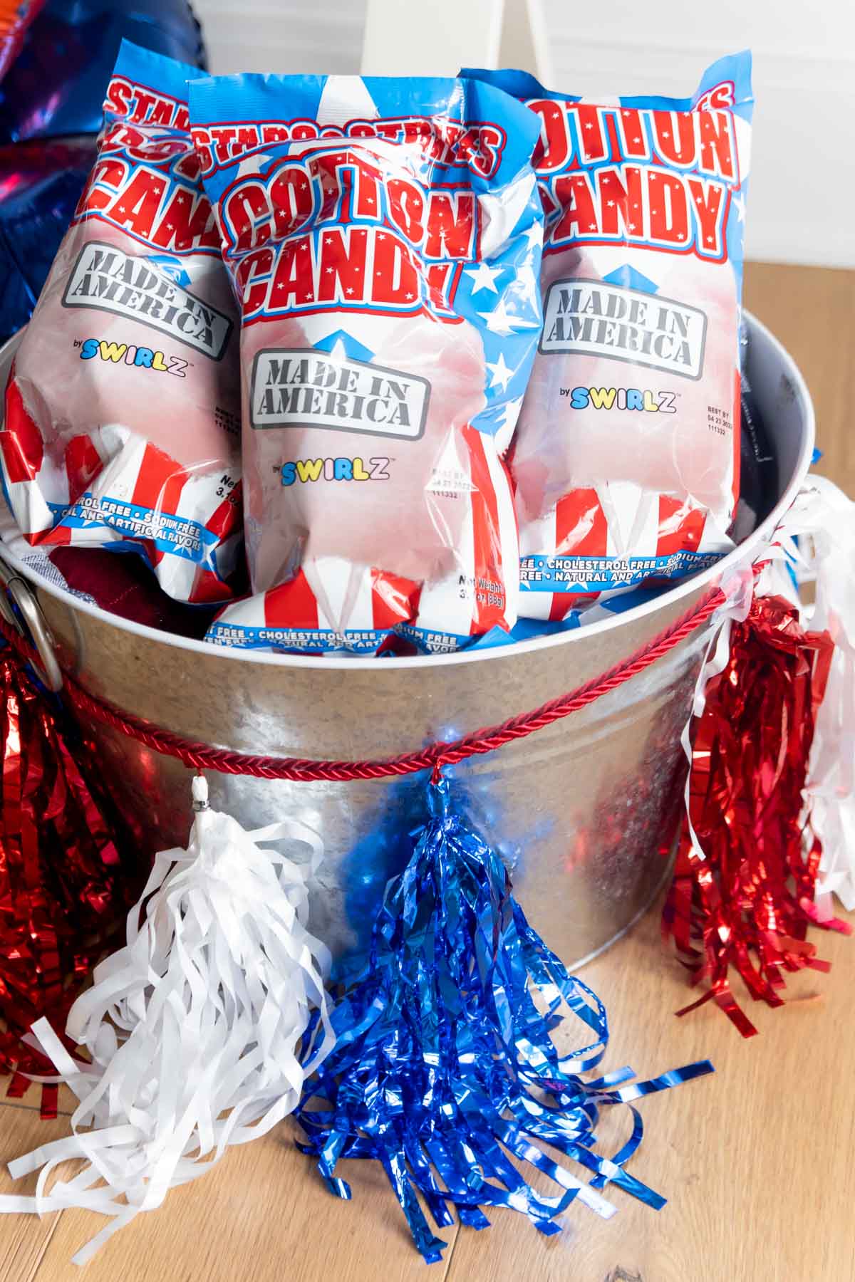 metal bin with cotton candy bags