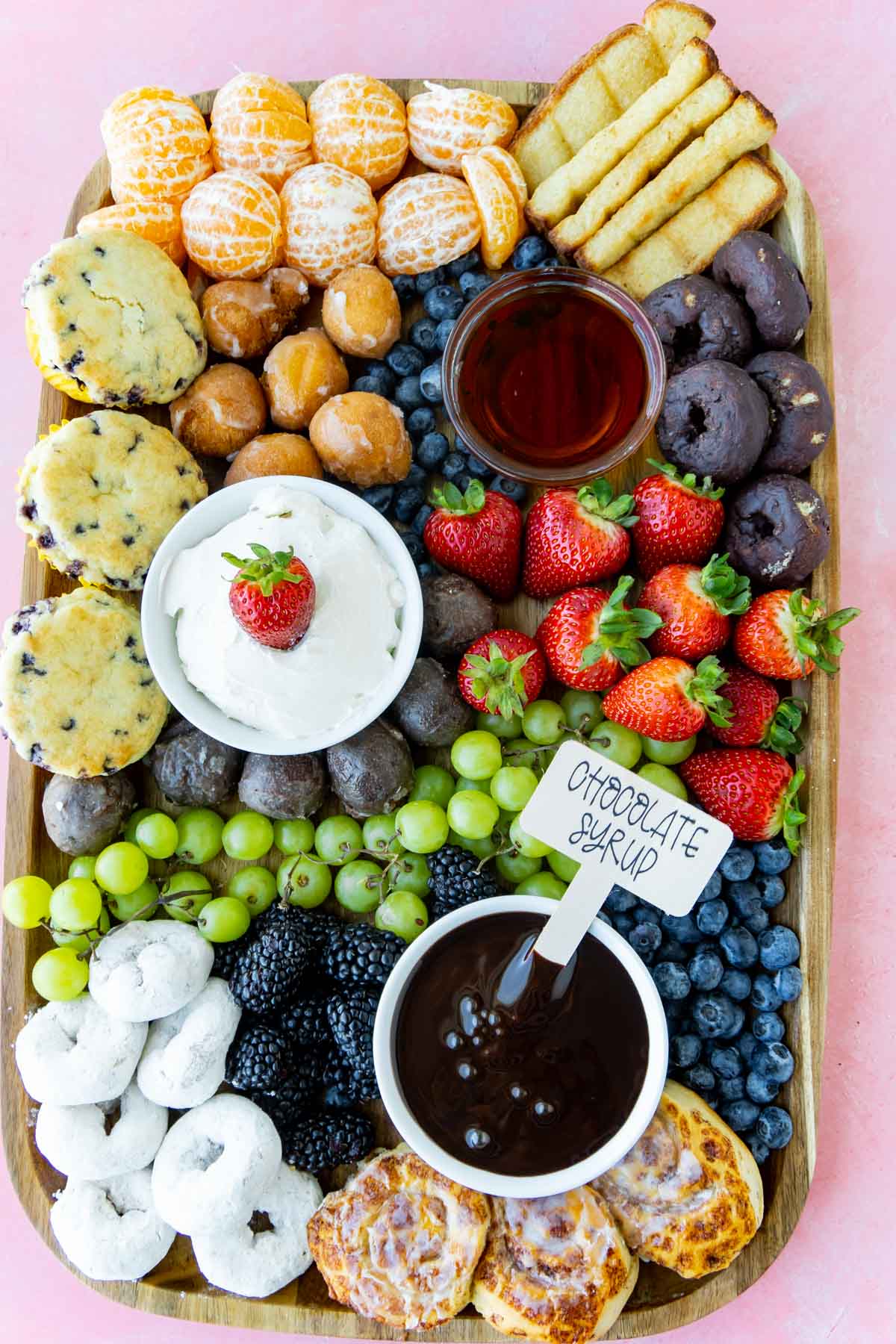 breakfast charcuterie board with chocolate syrup