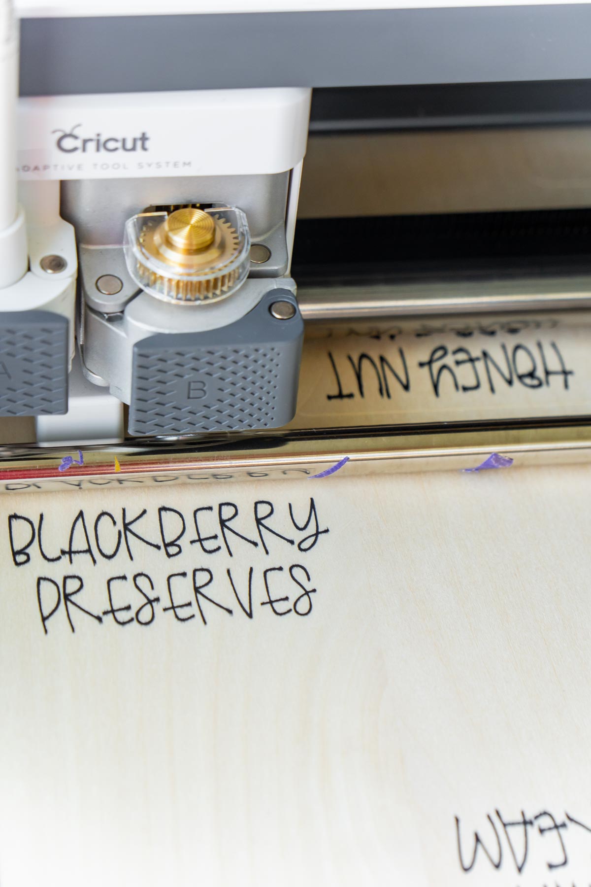 Cricut Maker writing letters with a pen