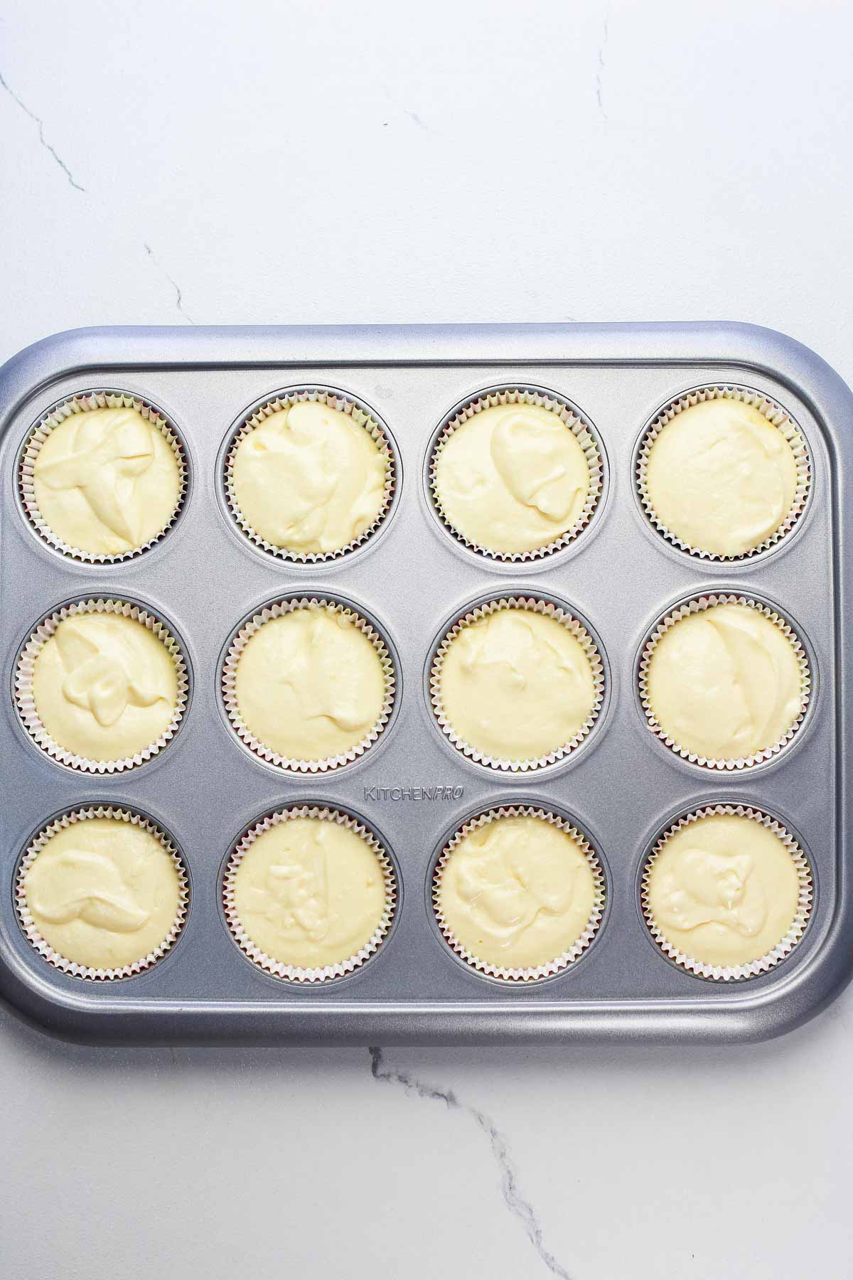 unbaked lemon cupcakes in cupcake pan