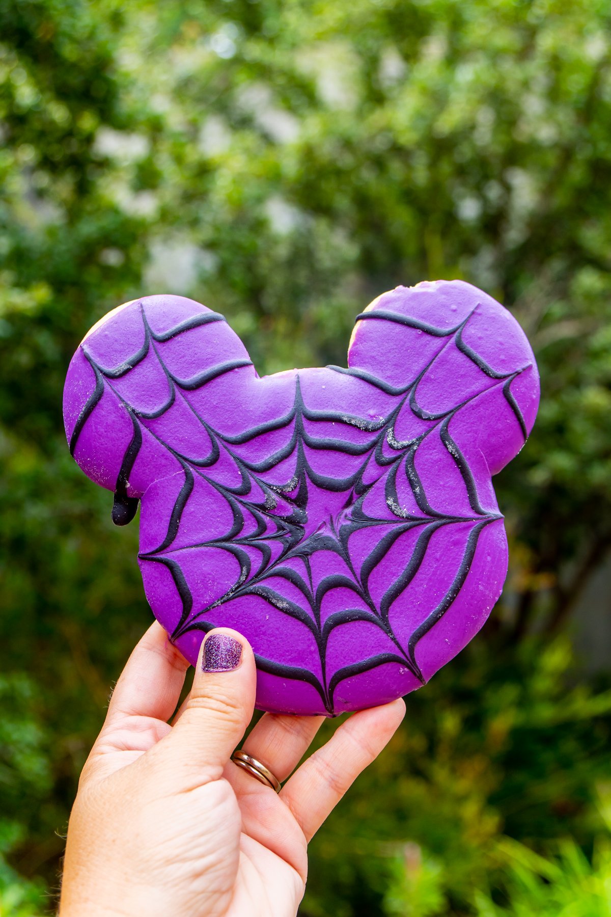 purple Mickey spiderweb sugar cookie