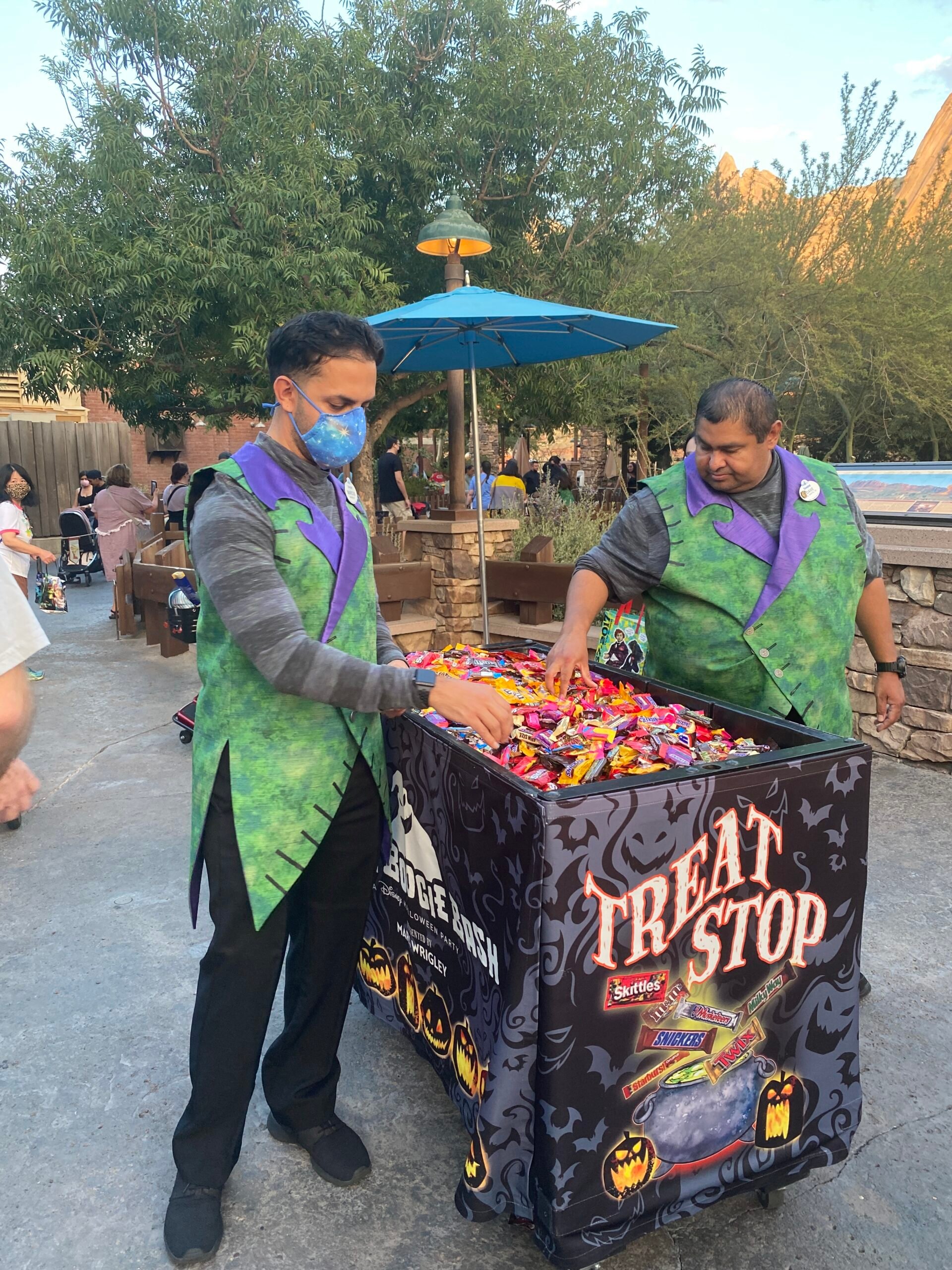 Disney cast member handing out treats