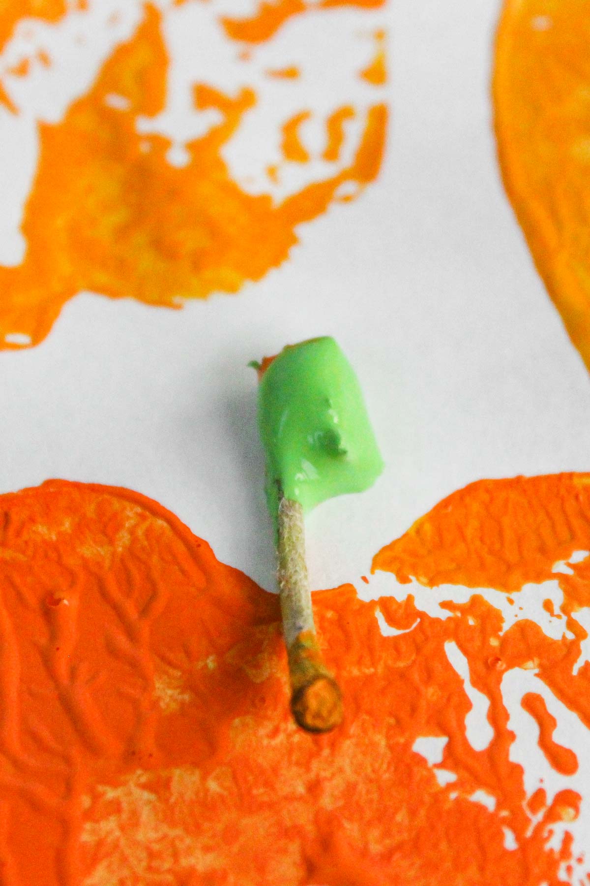 using an apple stem to paint