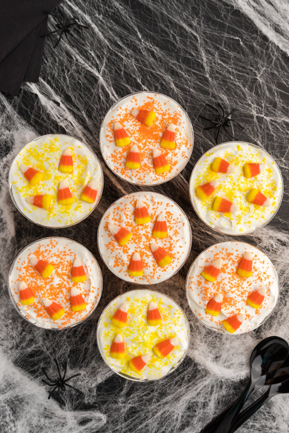 candy corn and sprinkles on cups with cool whip