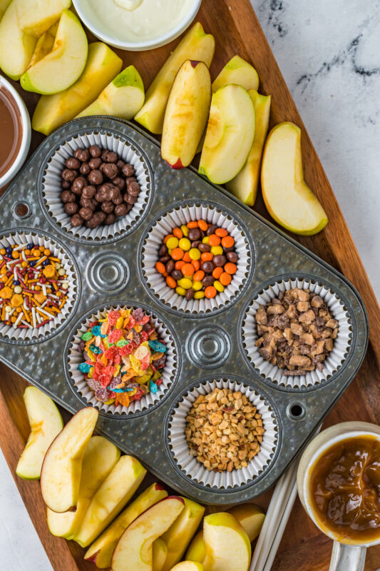caramel apple toppings in muffin tins