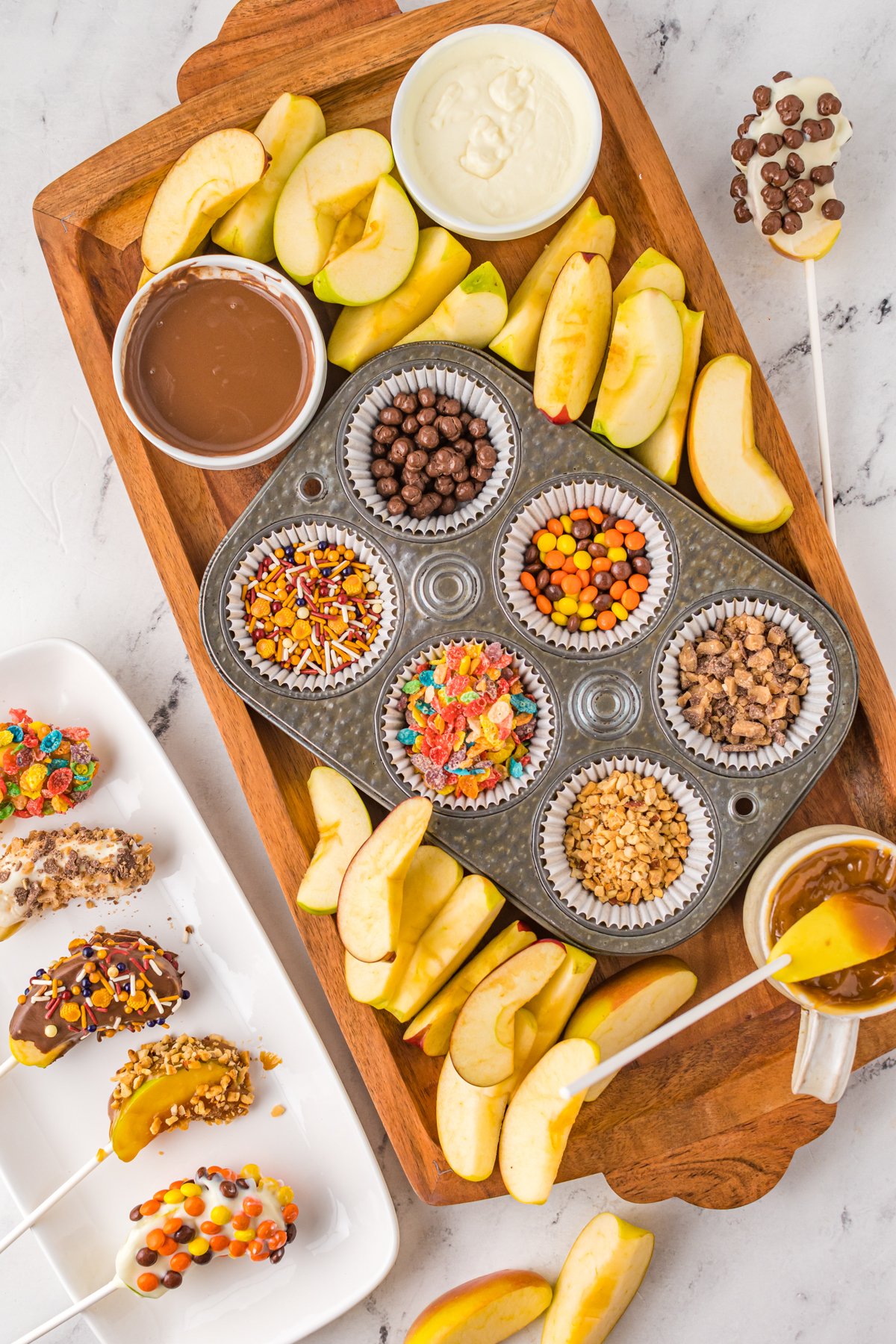 caramel apple board with sliced apples