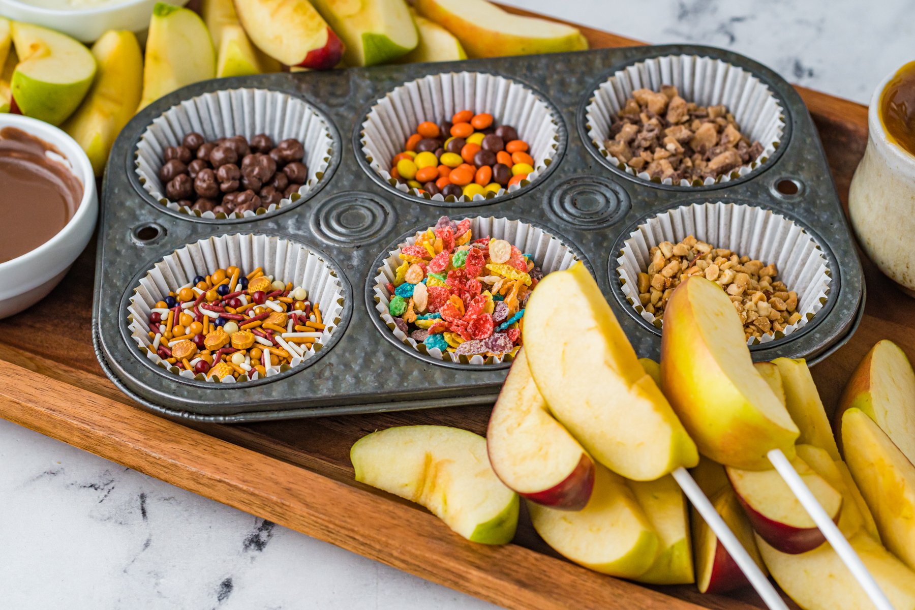 apples with sticks poked in them