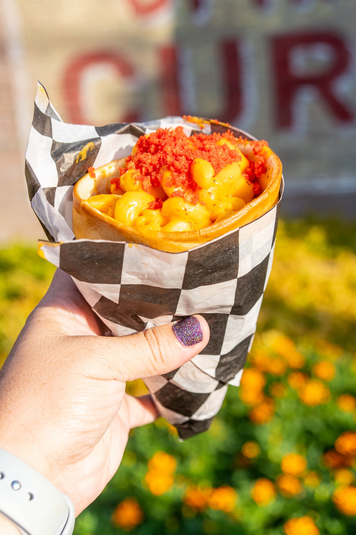 spicy mac and cheese in a bread cone