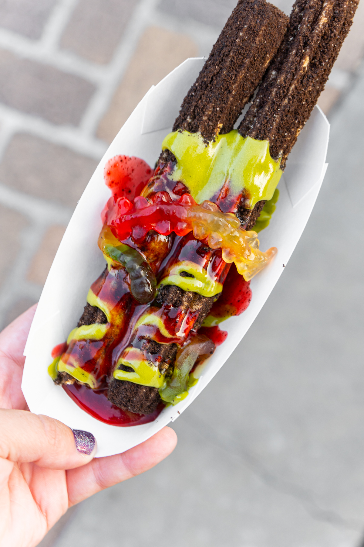 chocolate match churro with gummy worms