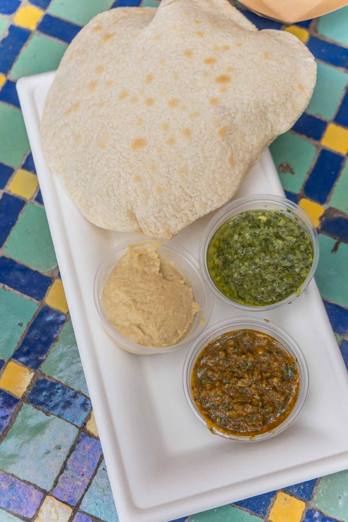 moroccan bread and dips on a plate