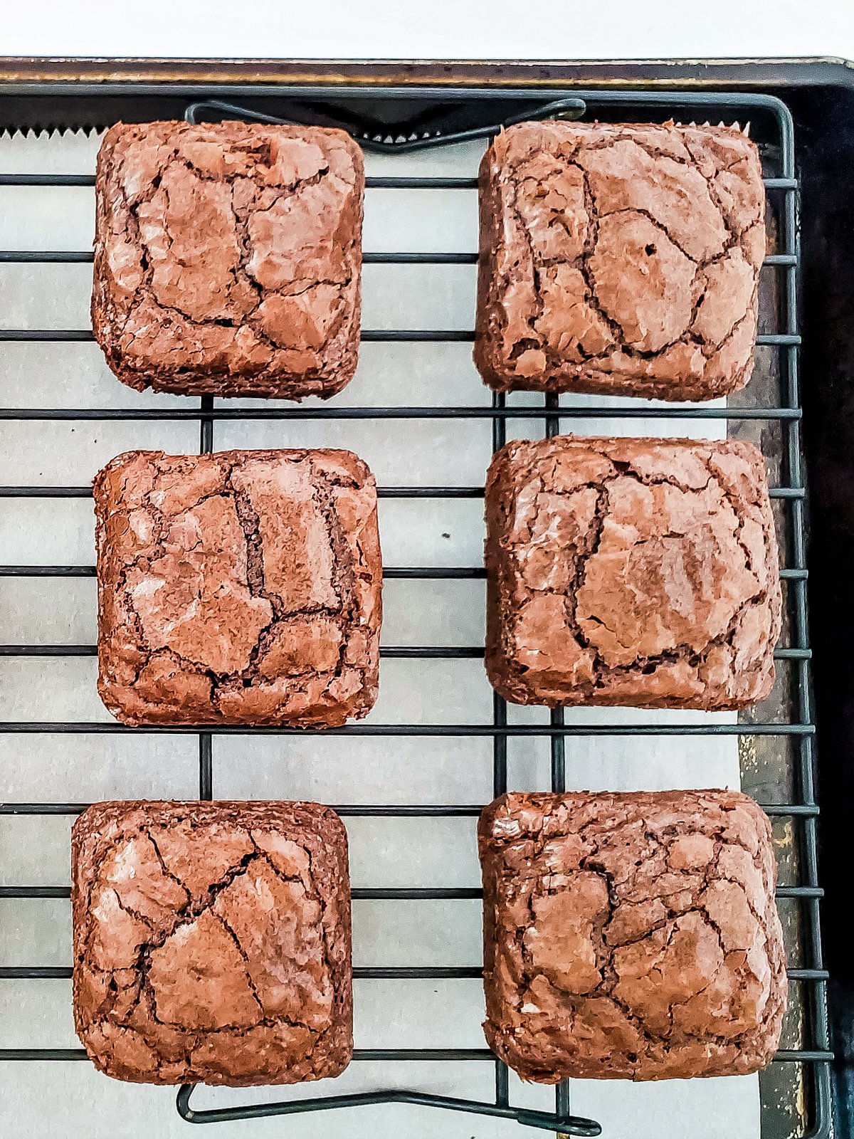 square brownies on a cooling rack