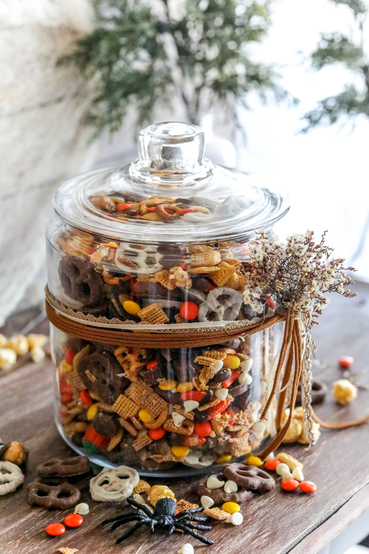 glass jar with fall snack mix