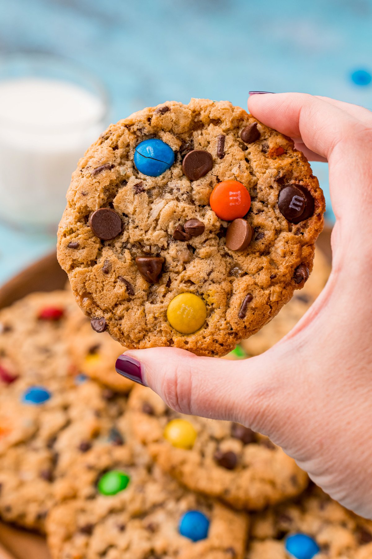 hand holding a monster cookie