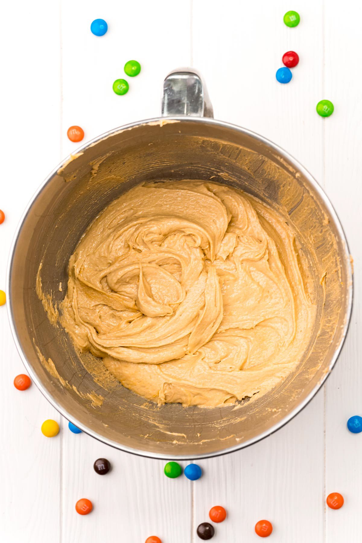 dough for monster cookies in a metal bowl