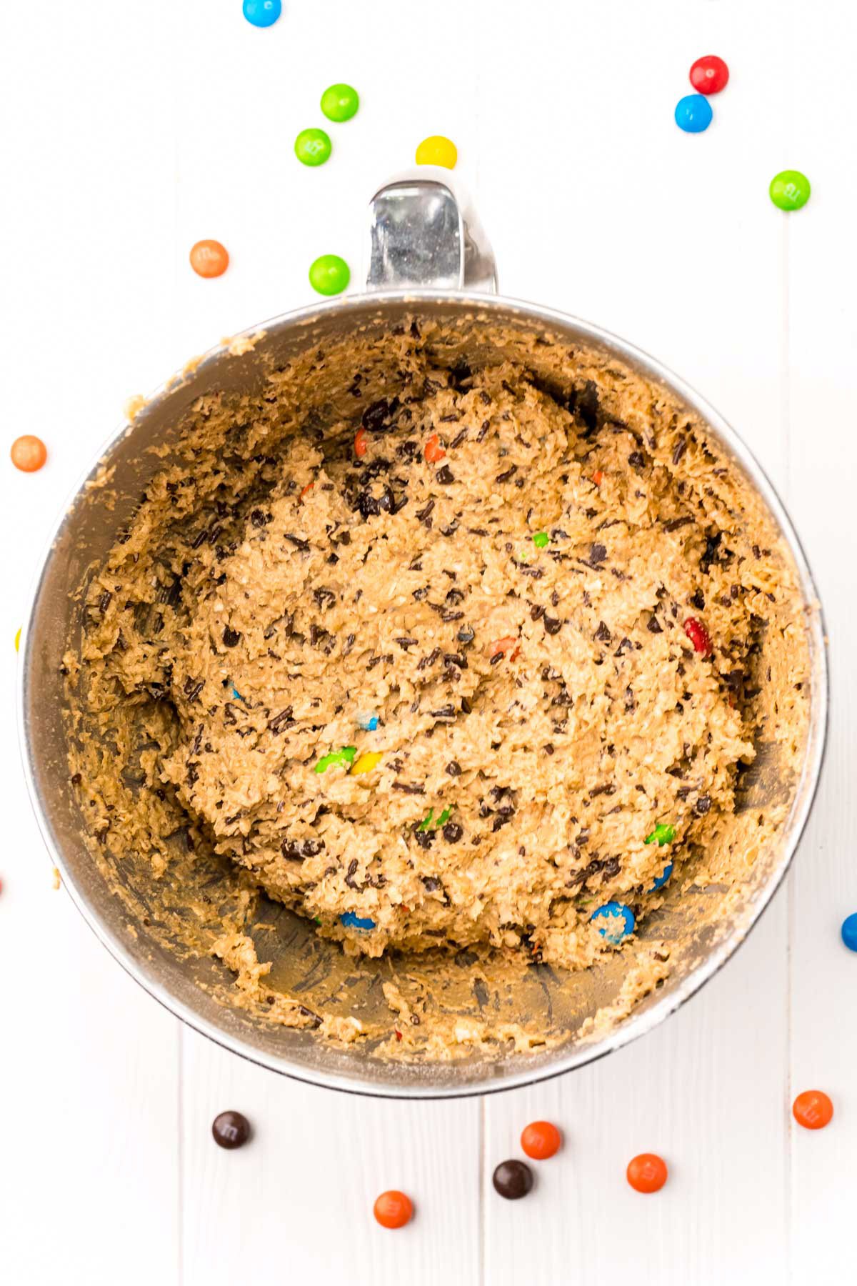 dough for monster cookies in a metal bowl