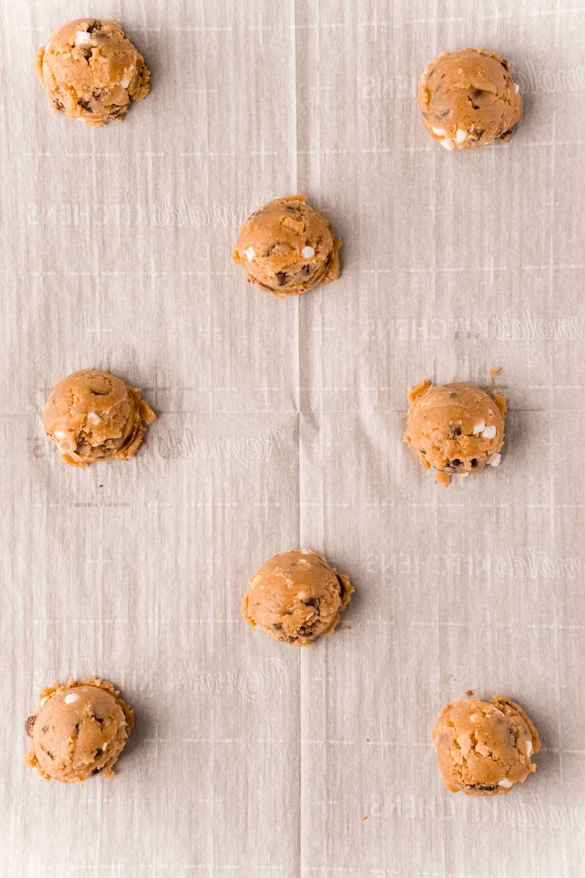 s'more cookie dough balls on a baking sheet