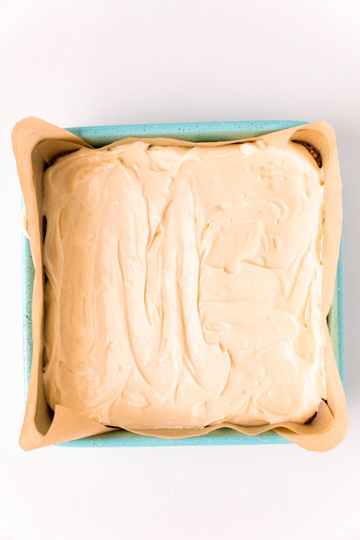 square baking dish with cheesecake topping