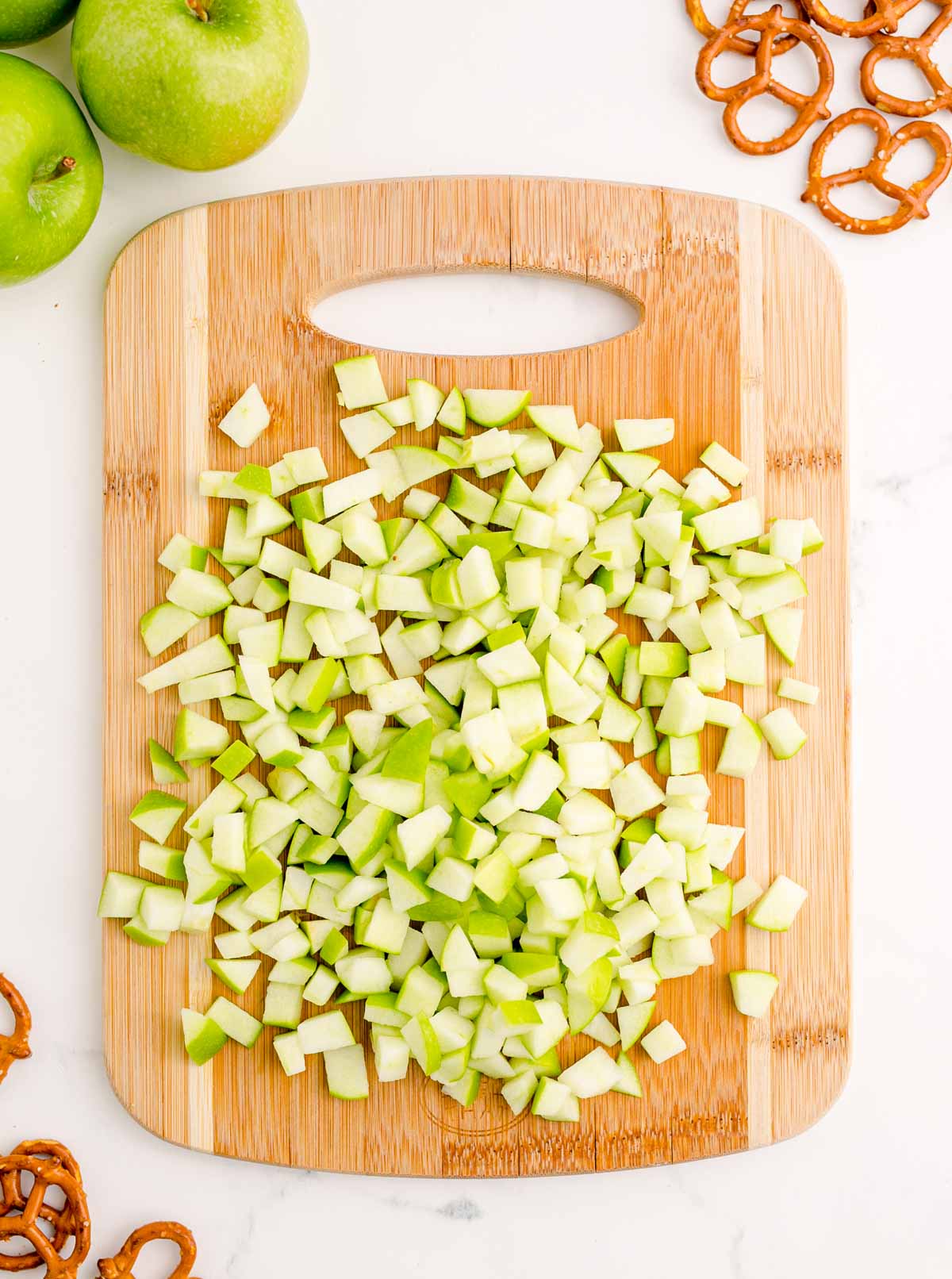 diced green apples on a cutting board