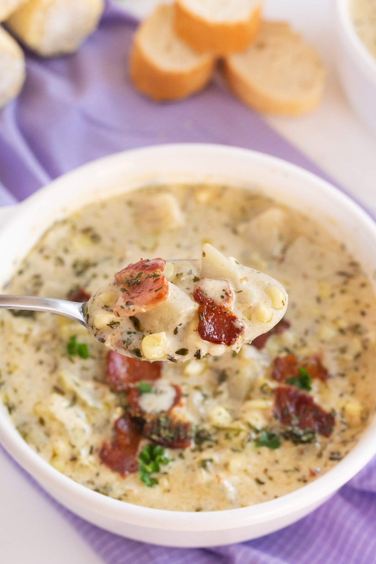 spoon full of potato and corn chowder