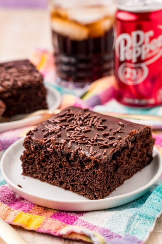 piece of Dr Pepper cake on a white plate