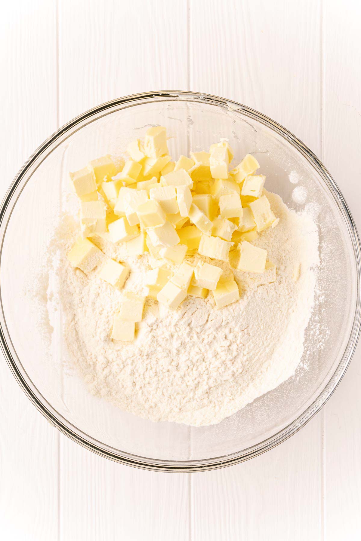 glass bowl with butter and flour