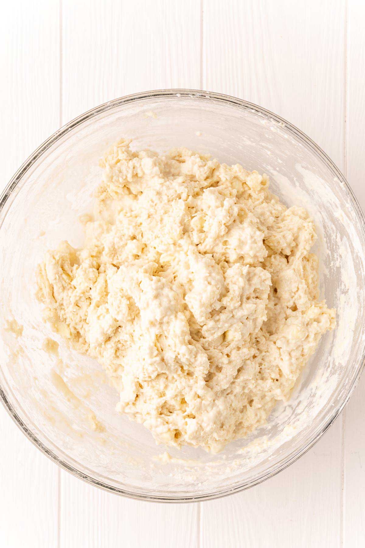 dough for drop biscuits in a glass bowl